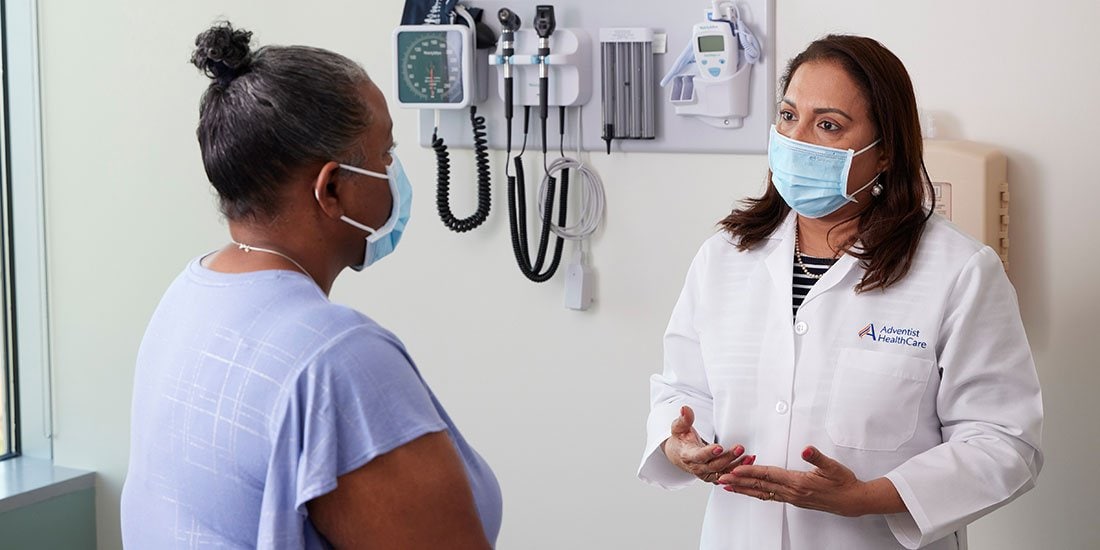 Dr. Daisy Lazarous with patient