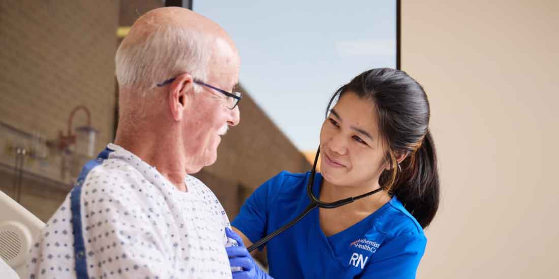 Adventist healthCare nurse with patient